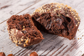 Close-up picture of chocolate cupcake with almonds and hazelnut