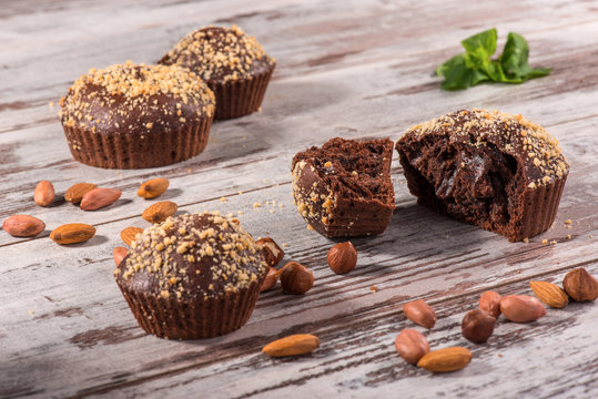 Close-up picture of chocolate cupcake with almonds and hazelnut