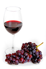 Red wine and grapes