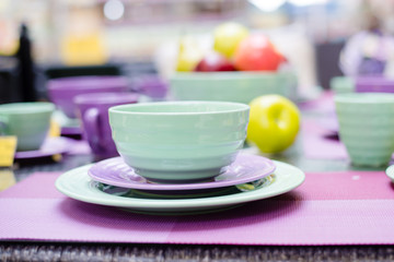 cute green and purple dinnerware sold in the supermarket