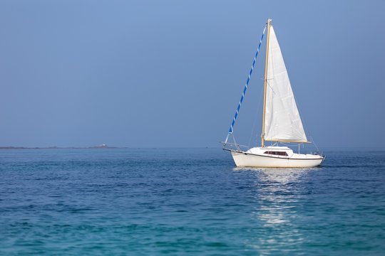 Sailboat On Calm Sea