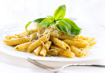 Pasta. Penne Pasta with Pesto Sauce. Italian Cuisine