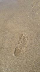 Fußstapfen im Sand