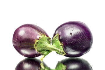 Two brinjals with reflection