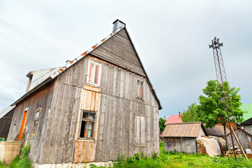 Fototapeta na wymiar Wooden old village in summer