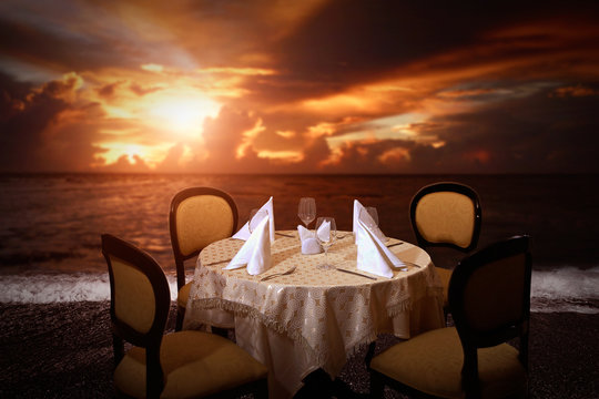 Evening Beach Dinner Serving In Sunset Light