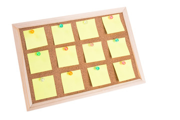 cork board with blank notes isolated on white