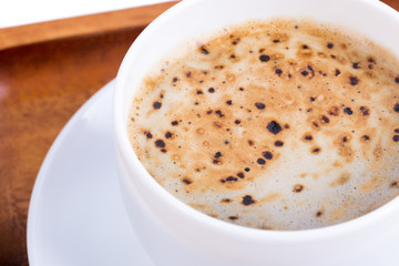 Cup of coffee on a wooden