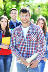 Obraz premium Happy students in park