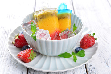Delicious ice cream on plate on table close-up