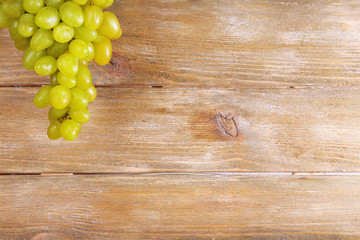 Bunch of grape on wooden background