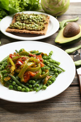 Healthy salad with peas and asparagus served