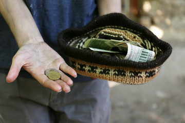 Homeless beggar money