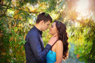 Fototapeta premium Man and woman couple flirting in a park