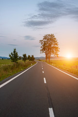 Fototapeta premium Sunrise over the road