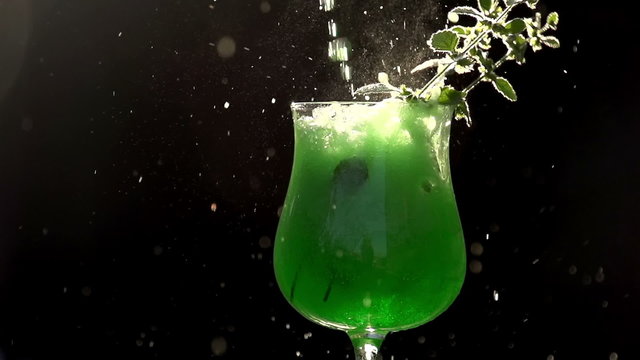 Green Soda Being Poured into a Glass
