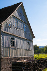 house with wooden boards decorated facade