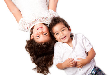 Family siblings laying together