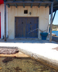 Fisherman's house by teh sea, Milos island, Greece