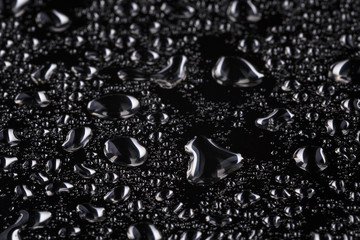 Fototapety  abstrakcyjne krople wody na polerowanej powierzchni ze stali nierdzewnej
