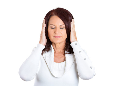 woman covering ears, closing her eyes on white background 