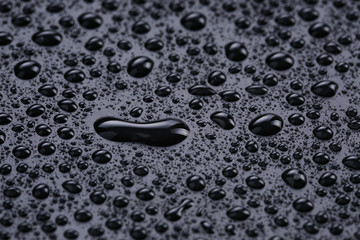 water drops on hydrophobic plastic surface
