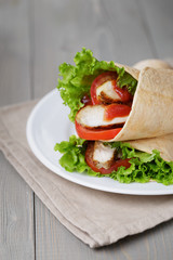 freshly made tortilla wraps with chicken and vegetables