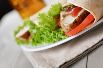 freshly made tortilla wraps with chicken and vegetables