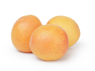 three ripe apricots