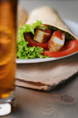 freshly made tortilla wraps with chicken and vegetables