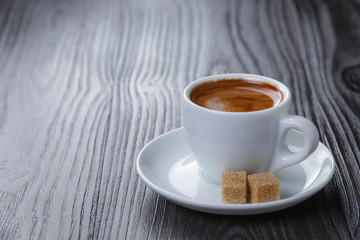 classic double espresso on wood table