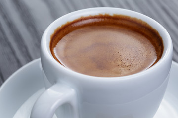 classic double espresso on wood table