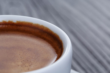 classic double espresso on wood table