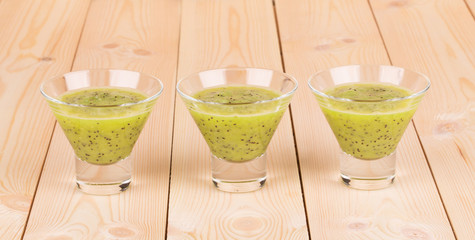 Kiwi fruits mixed in glass.