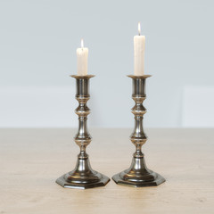 Retro Candelabra With Burning Candles On The Kitchen Table