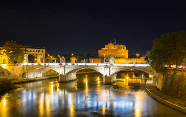Fototapeta na wymiar Night view of Castle Sant Angelo and river Tiber in Roma. Italy