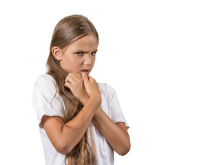 Stressed teenager girl looking anxiously afraid white background