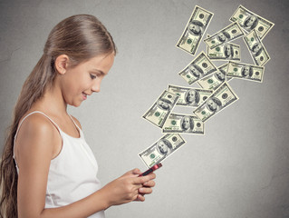 girl holding smart phone sending payment dollar bills flying 