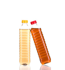 Bottles full of vinegar.