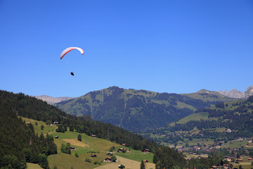 Paragliding over the village of Gstaad