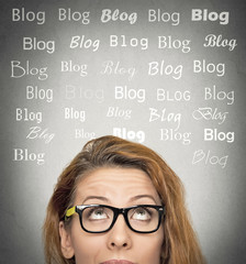 woman with thoughtful expression, blog words above head