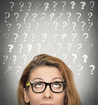 woman with puzzled face expression question marks above head