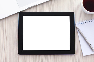 tablet with isolated screen is on the table