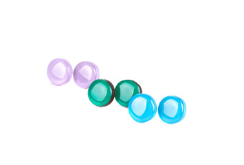 Three pairs of varnished earrings.