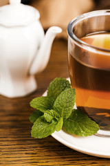 Teacup with fresh green tea