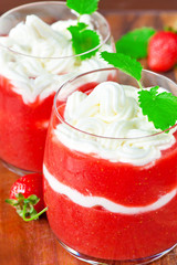 Homemade spring dessert. Fresh strawberry with whipped cream.