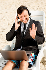 Businessman on the beach