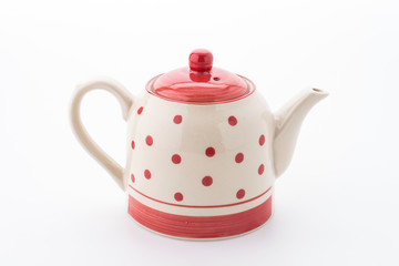 Polka dot tea pot isolated on white background