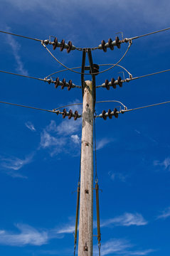 Wooden Power Electricity Pole Pylon,Blue Sky Background