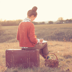 Hipster styled woman drawing